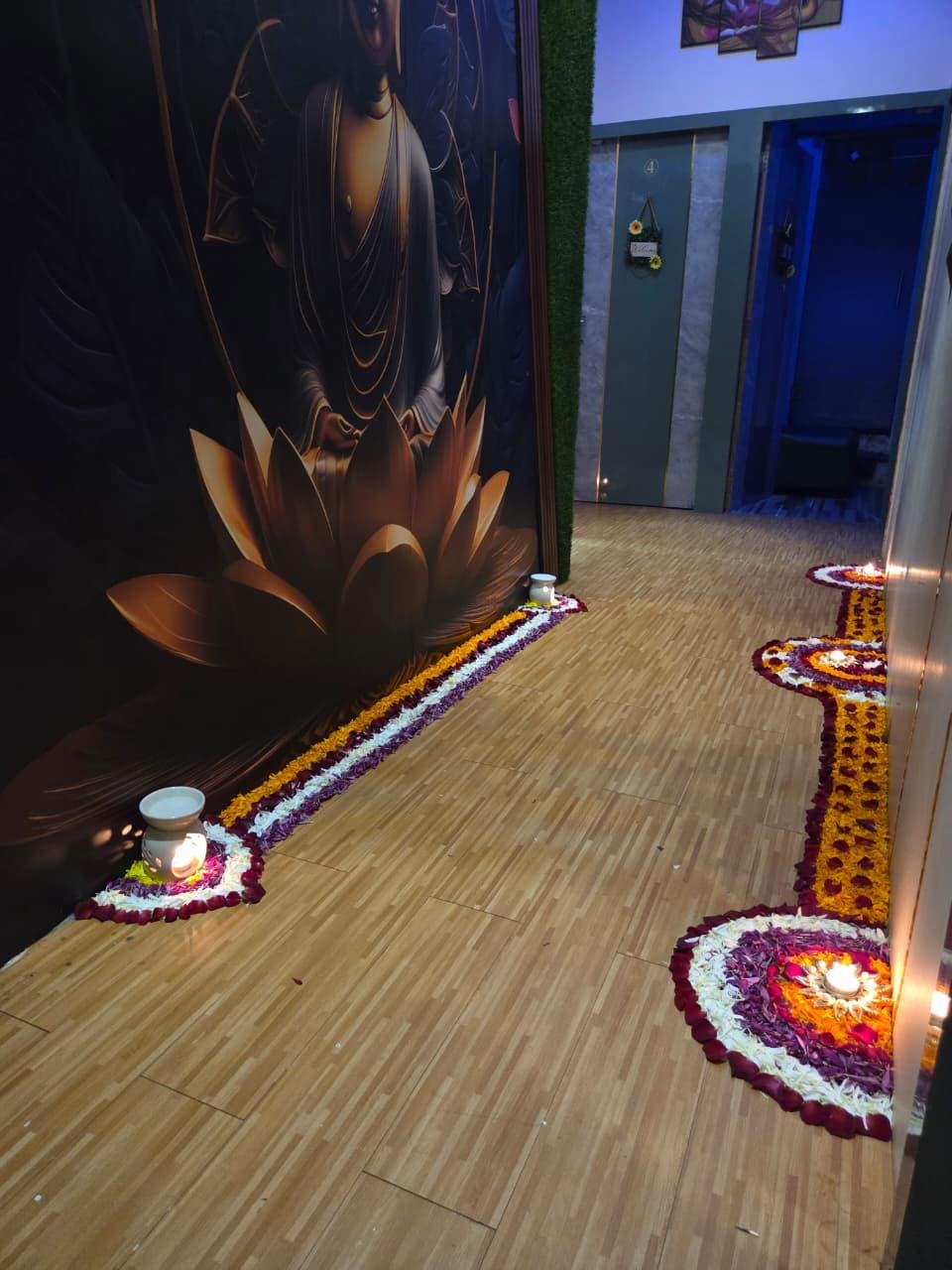 Flower rangoli decoration in spa corridor