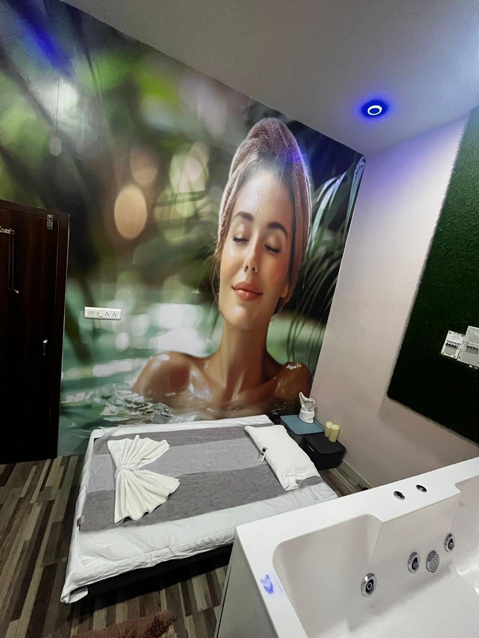 Massage bed in serene orchid-themed room