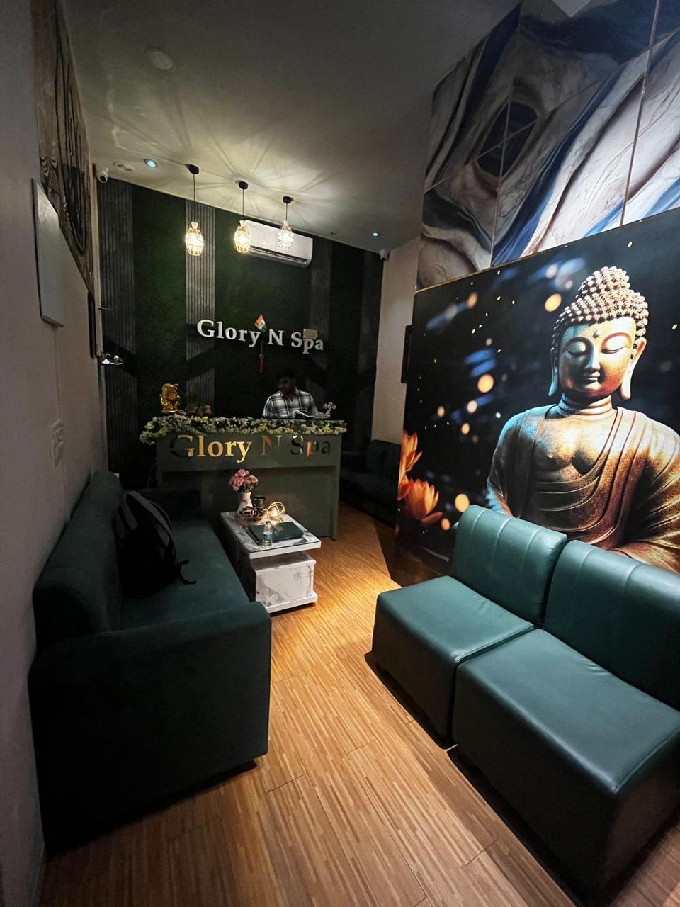 Glory N Spa reception desk with Buddha mural